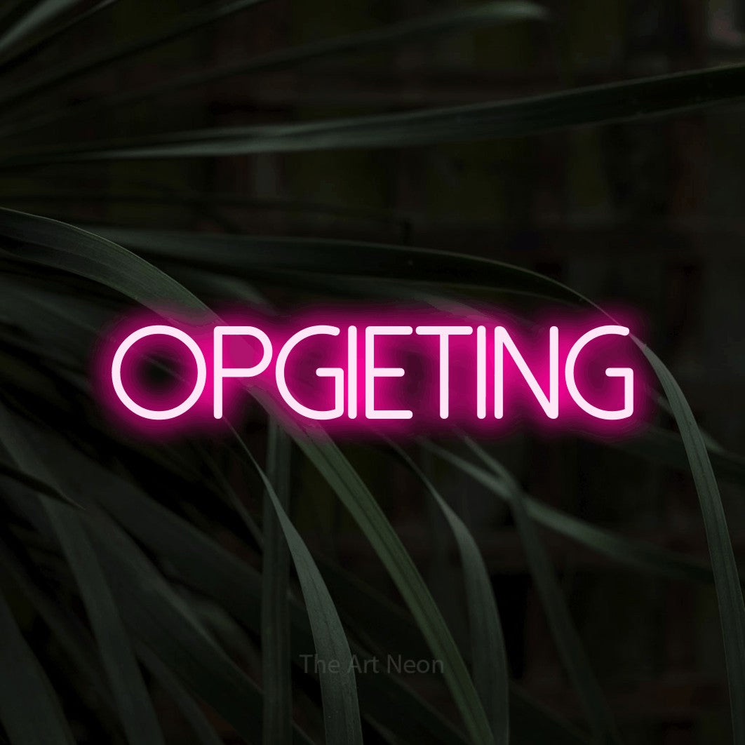 LED neon sign reading “OPGIETING”, arranged in a single line.