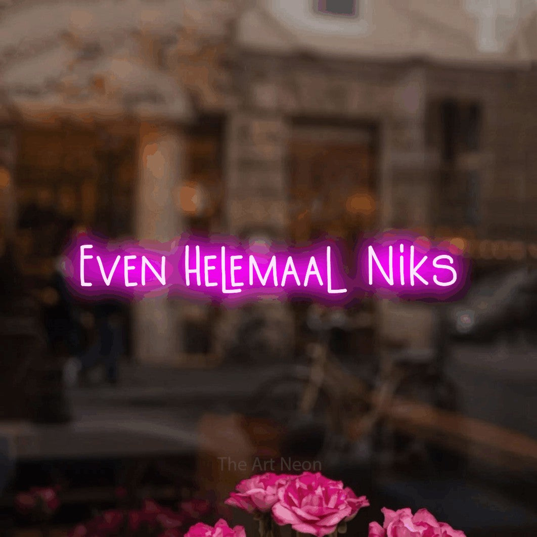 LED neon sign reading “Even Helemaal Niks”, arranged in a single line.