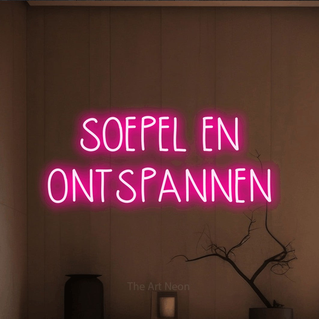 LED neon sign reading “SOEPEL EN ONTSPANNEN”, arranged in 2 lines.