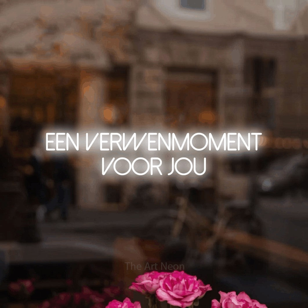 LED neon sign reading “Een Verwenmoment Voor Jou”, arranged in 2 lines.