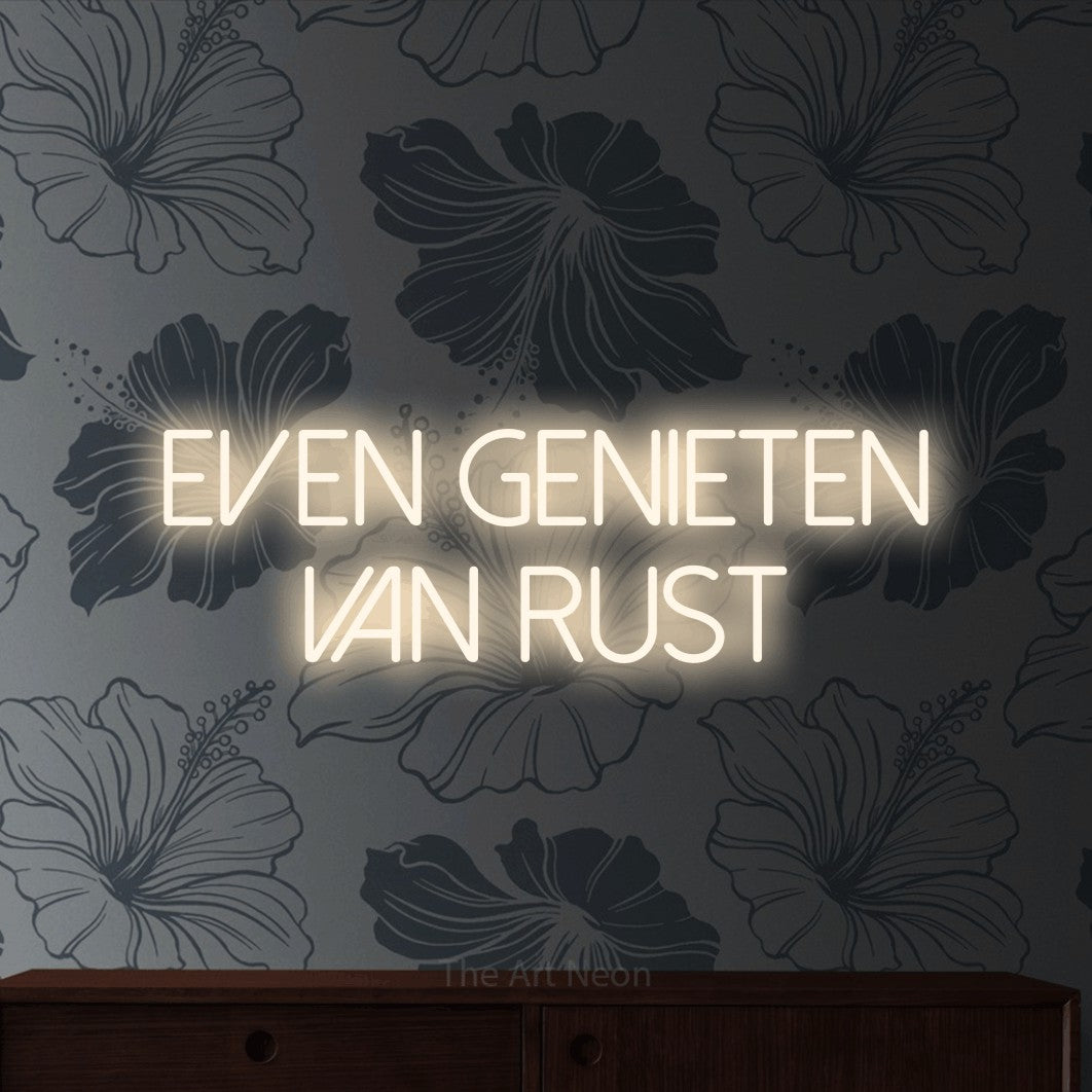 LED neon sign reading “EVEN genieten van rust”, arranged in 2 lines.