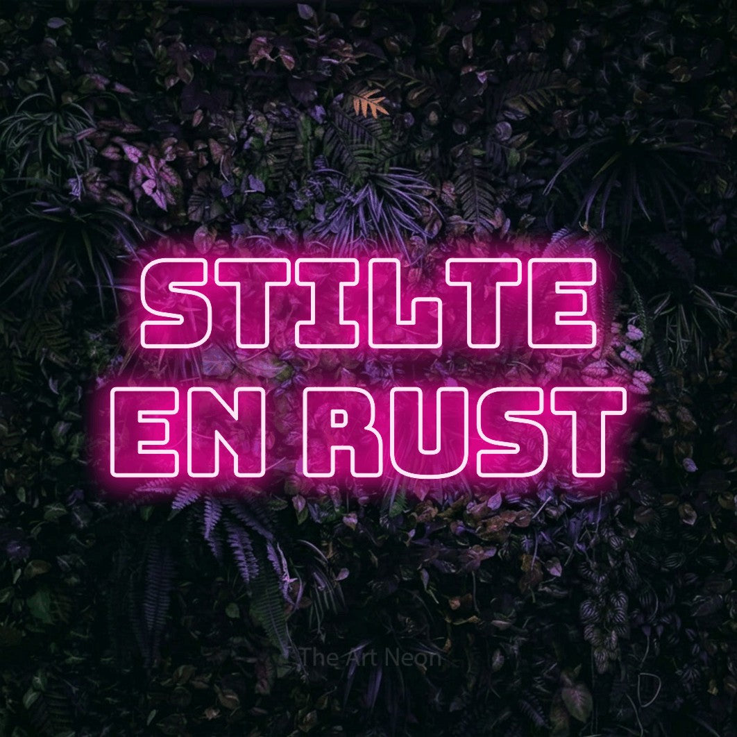 LED neon sign reading “STILTE EN RUST”, arranged in 2 lines.