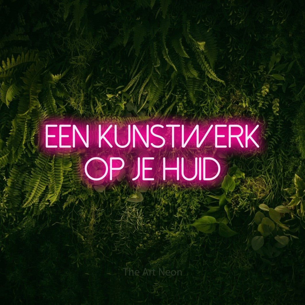 LED neon sign reading “Een Kunstwerk Op Je Huid”, arranged in 2 lines.