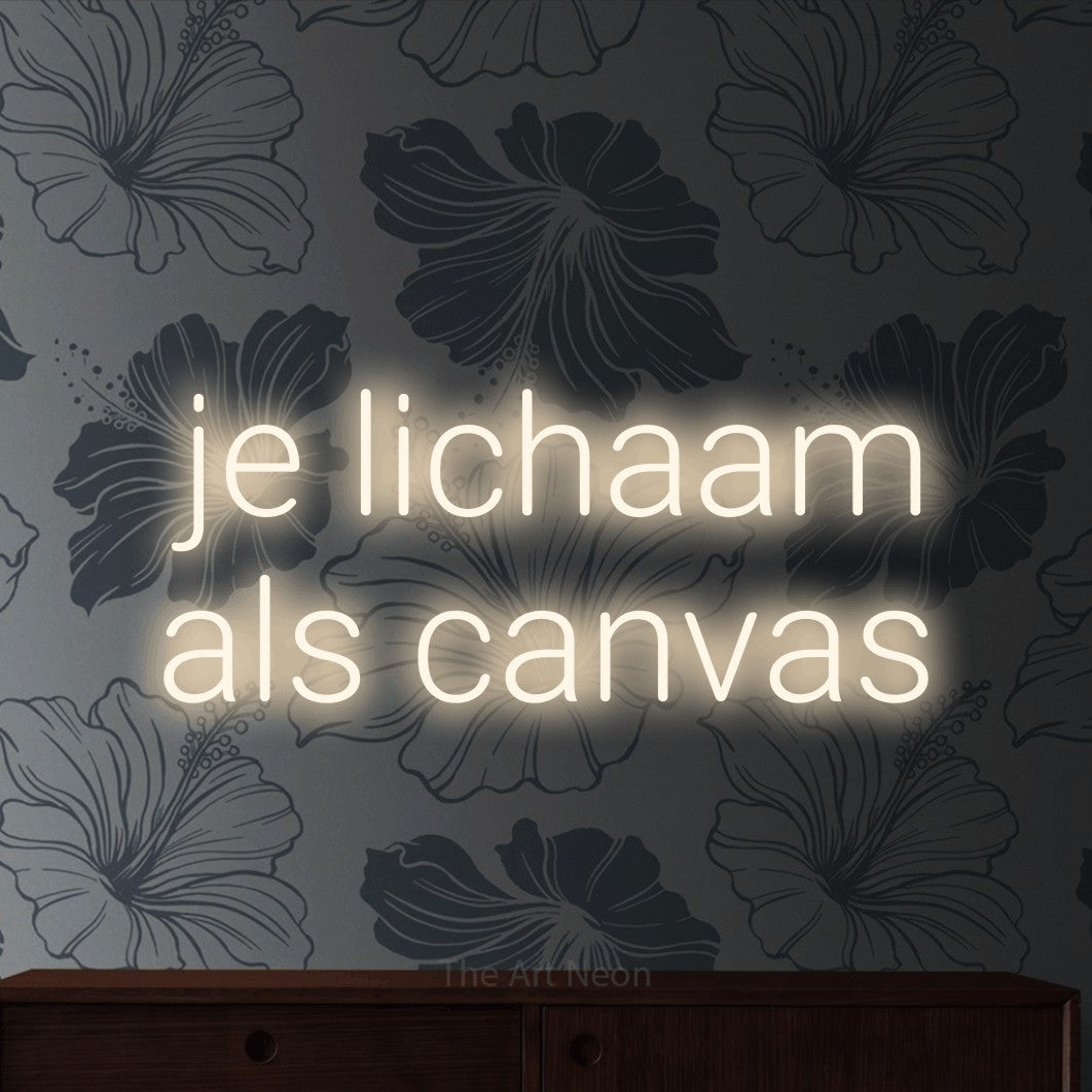 LED neon sign reading “je lichaam als canvas”, arranged in 2 lines.