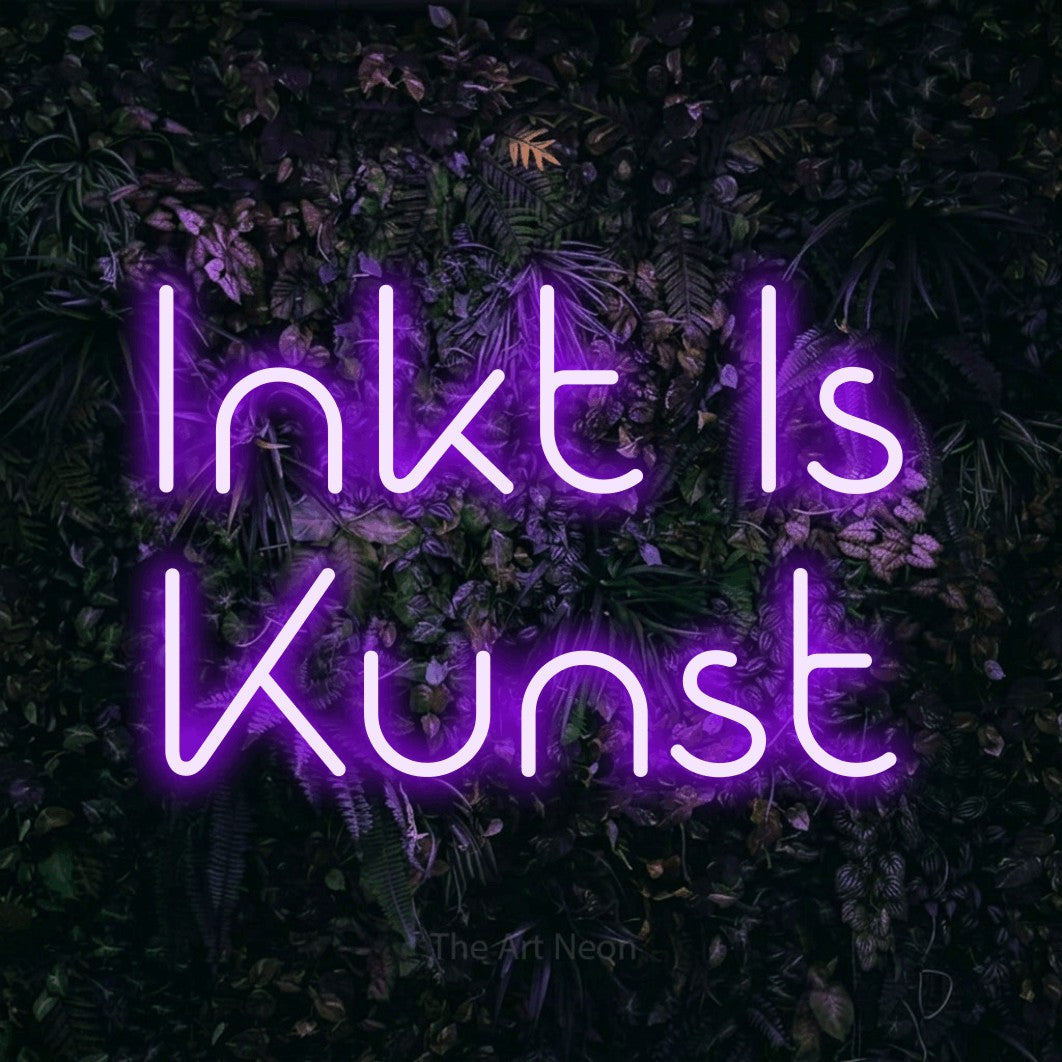 LED neon sign reading “Inkt Is Kunst”, arranged in 2 lines.