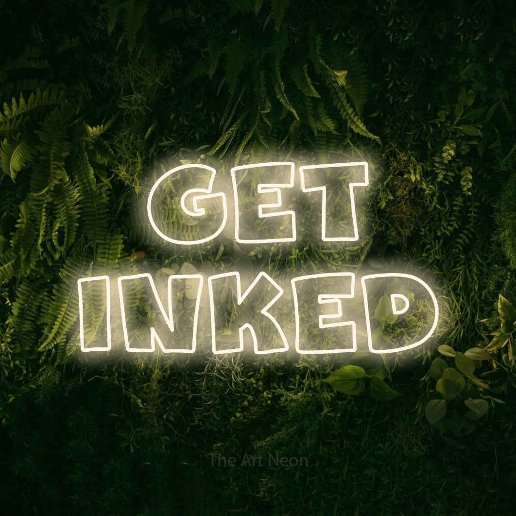 LED neon sign reading “Get Inked”, arranged in 2 lines.