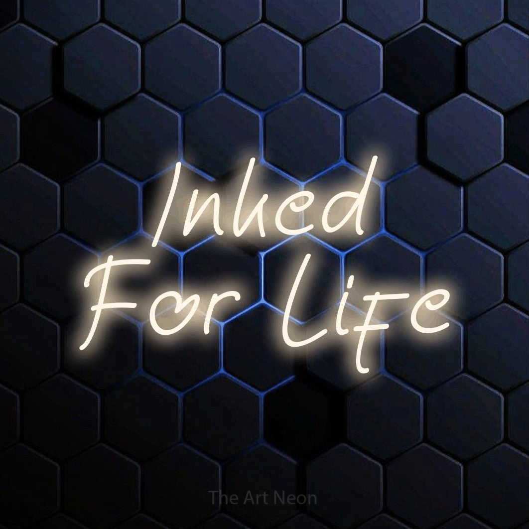 LED neon sign reading “Inked For Life”, arranged in 2 lines.