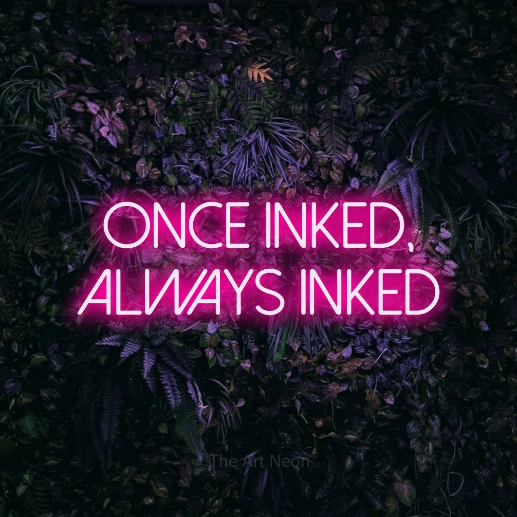 LED neon sign reading “once inked, always inked”, arranged in 2 lines.