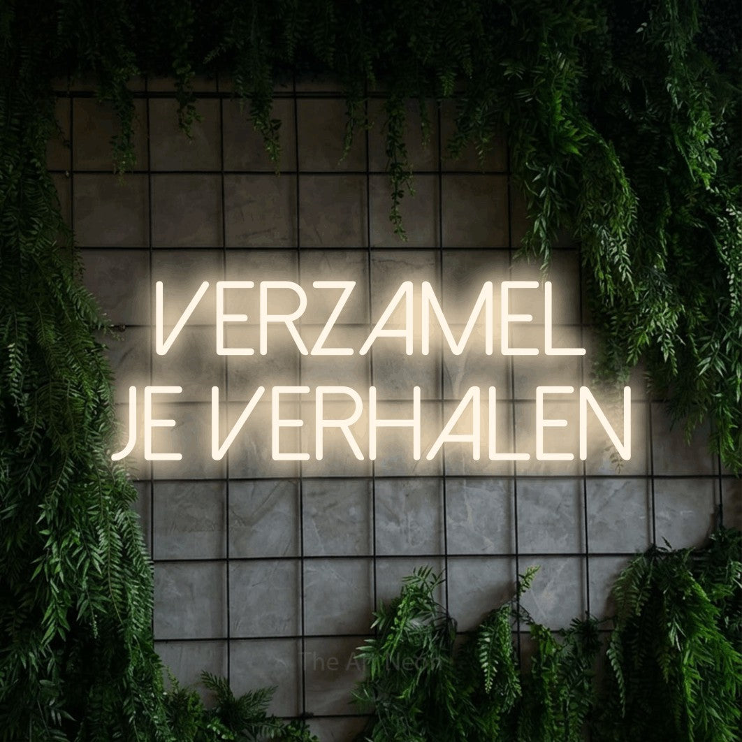 LED neon sign reading “Verzamel Je Verhalen”, arranged in 2 lines.