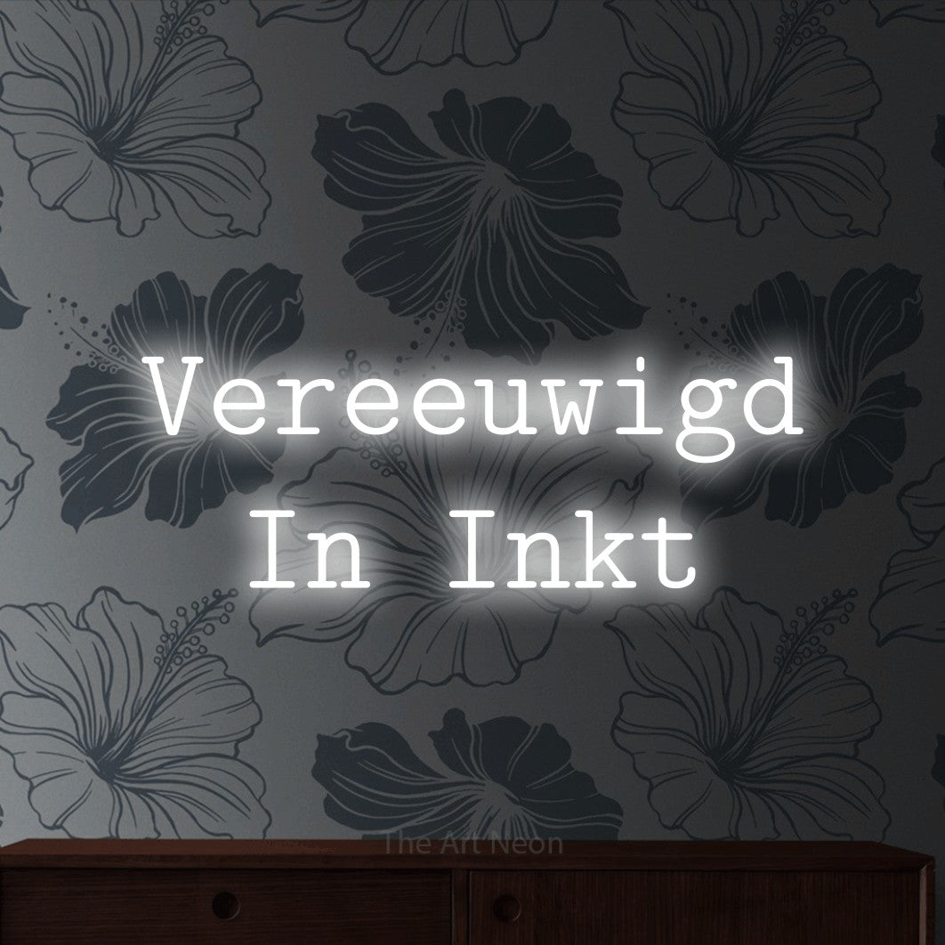 LED neon sign reading “Vereeuwigd In Inkt”, arranged in 2 lines.