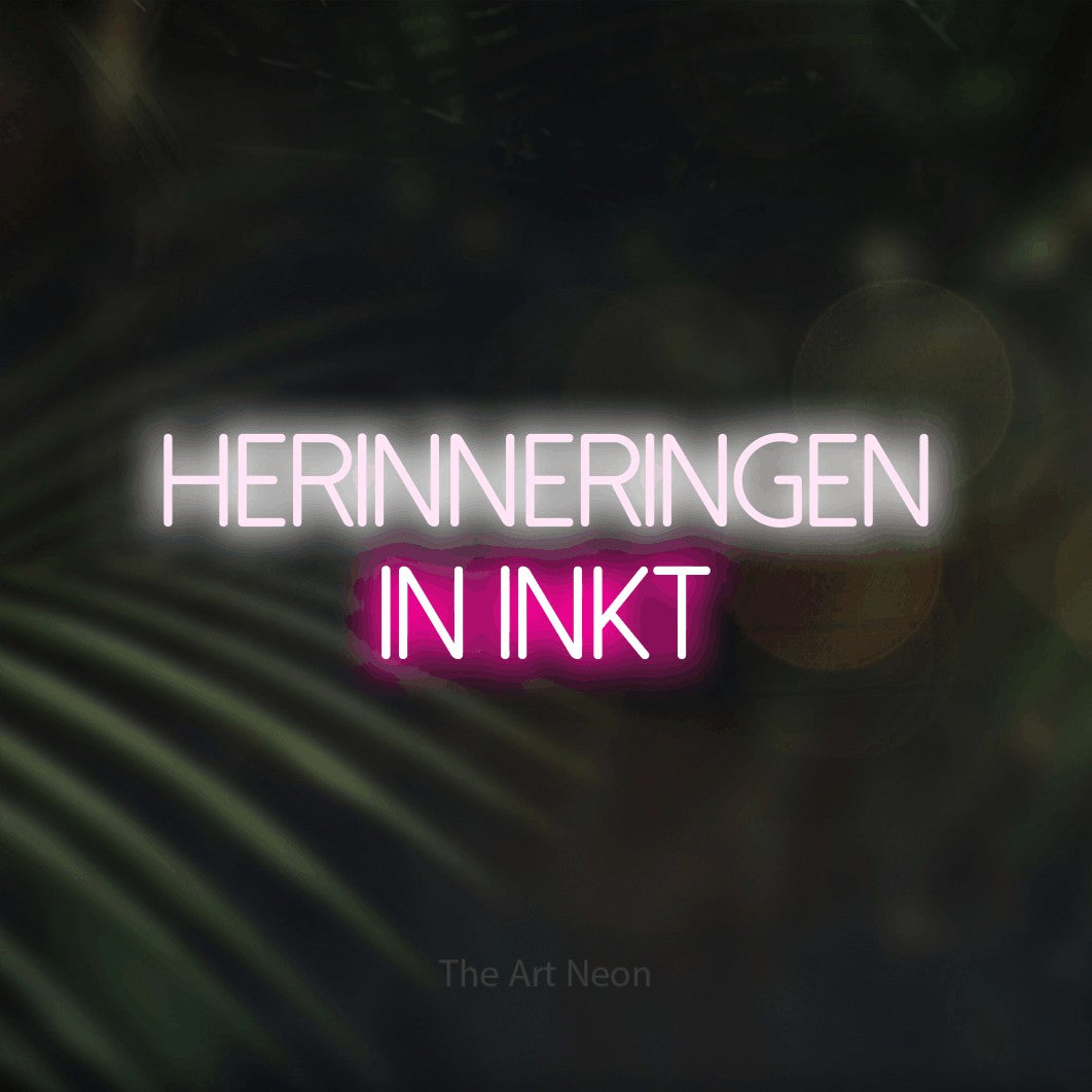 LED neon sign reading “HERINNERINGEN in inkt”, arranged in 2 lines.