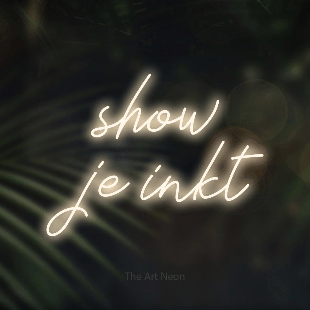 LED neon sign reading “show je inkt”, arranged in 2 lines.