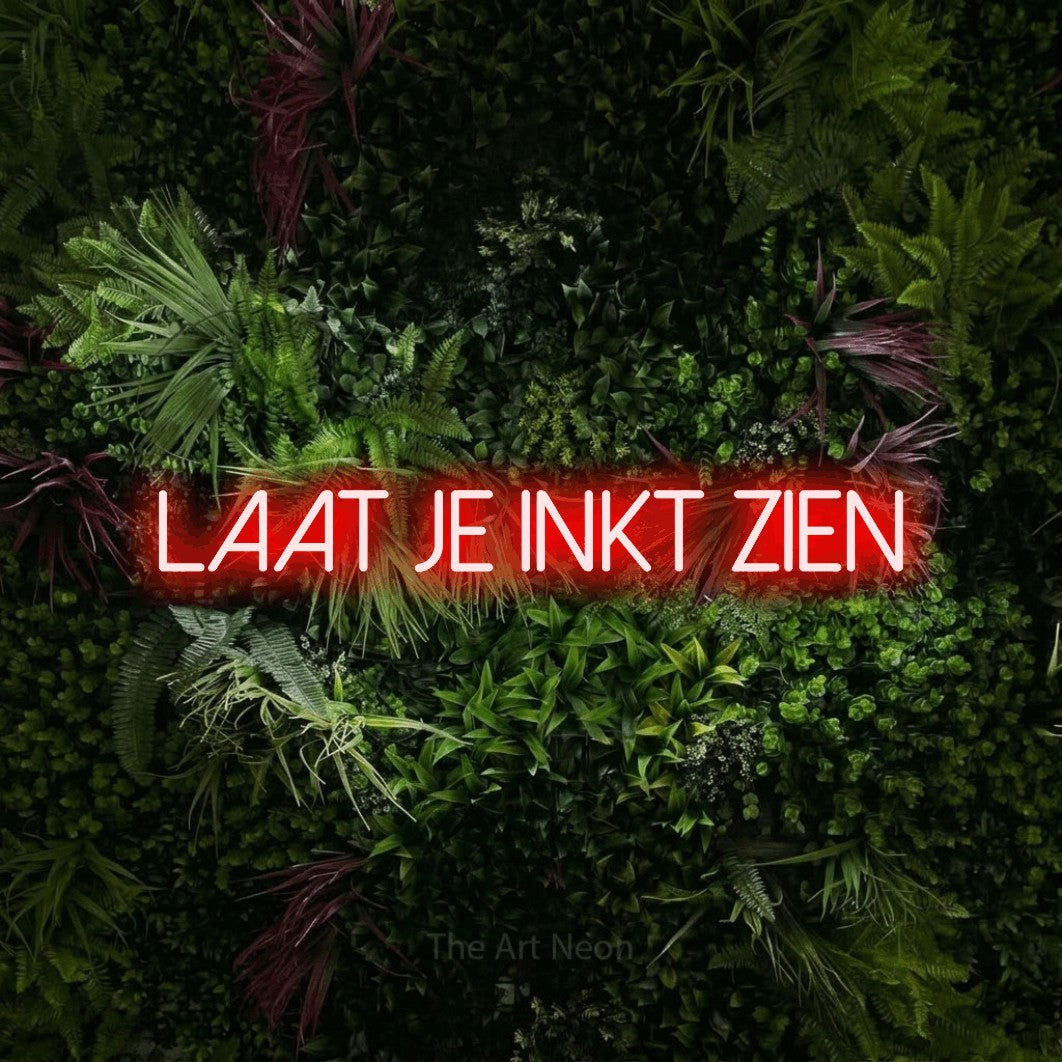 LED neon sign reading “Laat Je Inkt Zien”, arranged in a single line.