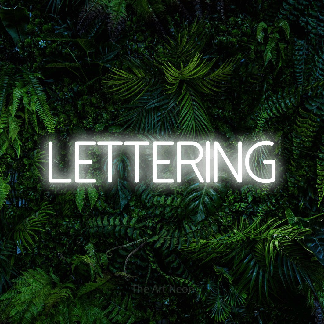 LED neon sign reading “Lettering”, arranged in a single line.
