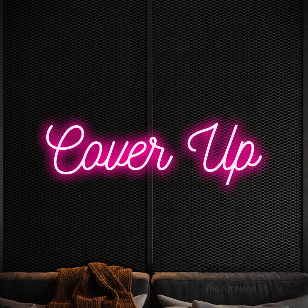 LED neon sign reading “Cover Up”, arranged in a single line.