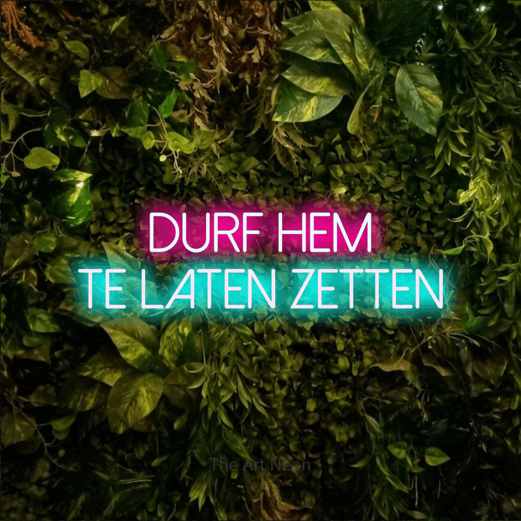 LED neon sign reading “Durf Hem Te Laten Zetten”, arranged in 2 lines.