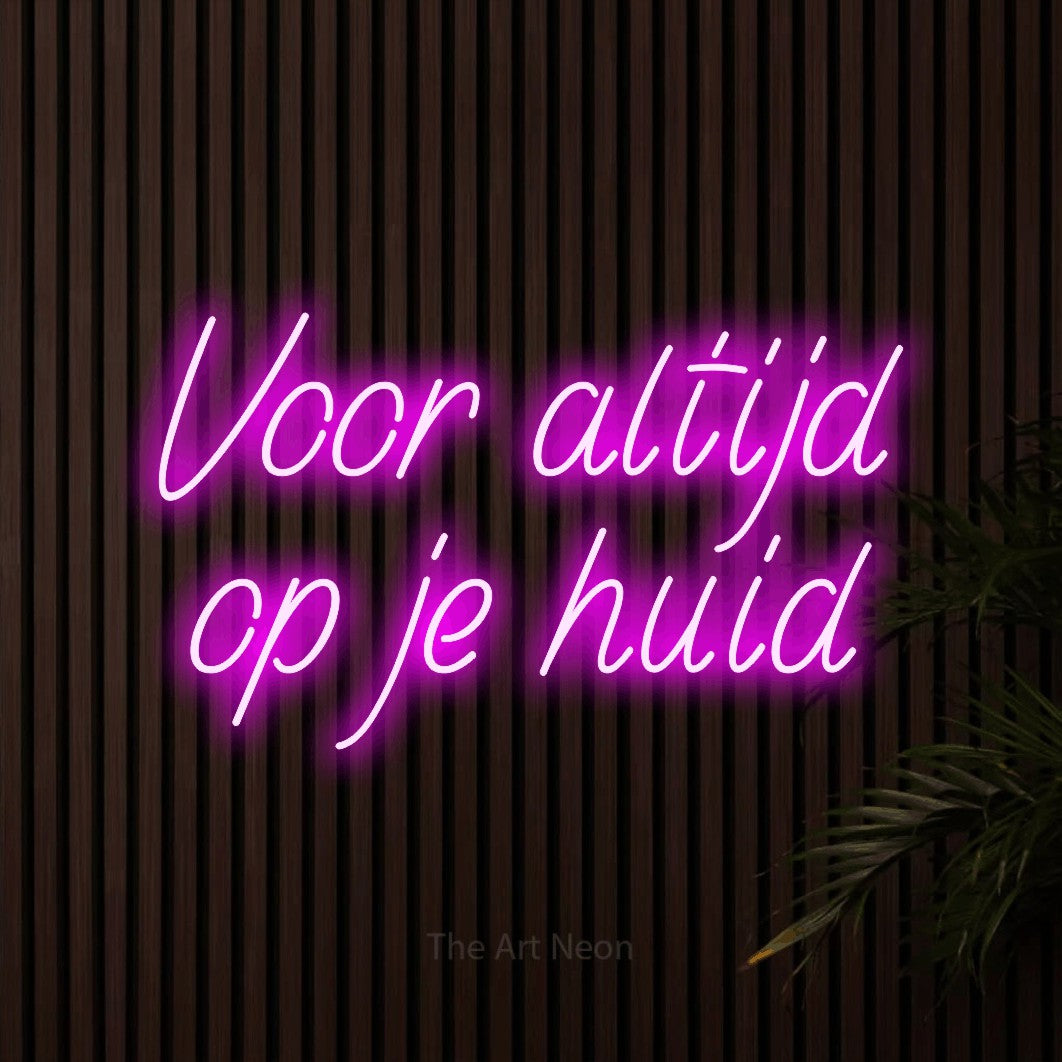 LED neon sign reading “Voor altijd op je huid”, arranged in 2 lines.
