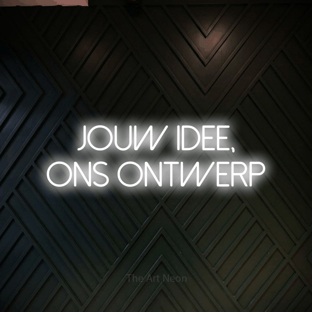 LED neon sign reading “JOUW IDEE, ONS ONTWERP”, arranged in 2 lines.