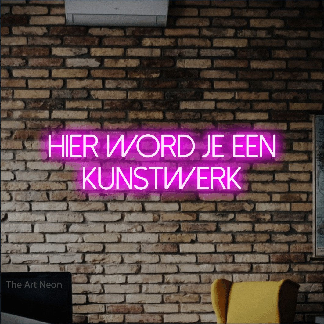 LED neon sign reading “hier word je een kunstwerk”, arranged in 2 lines.