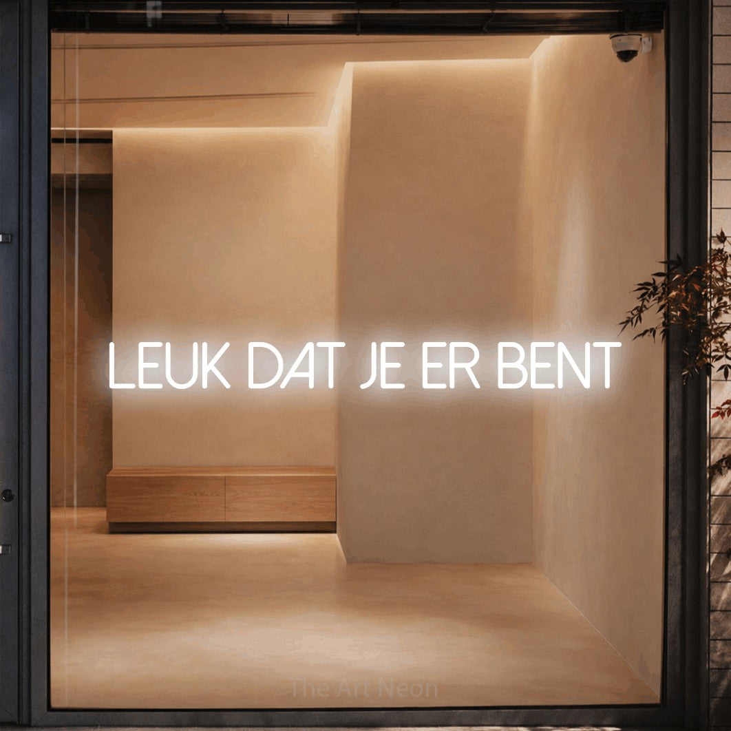 LED neon sign reading “LEUK dat je er bent”, arranged in a single line.