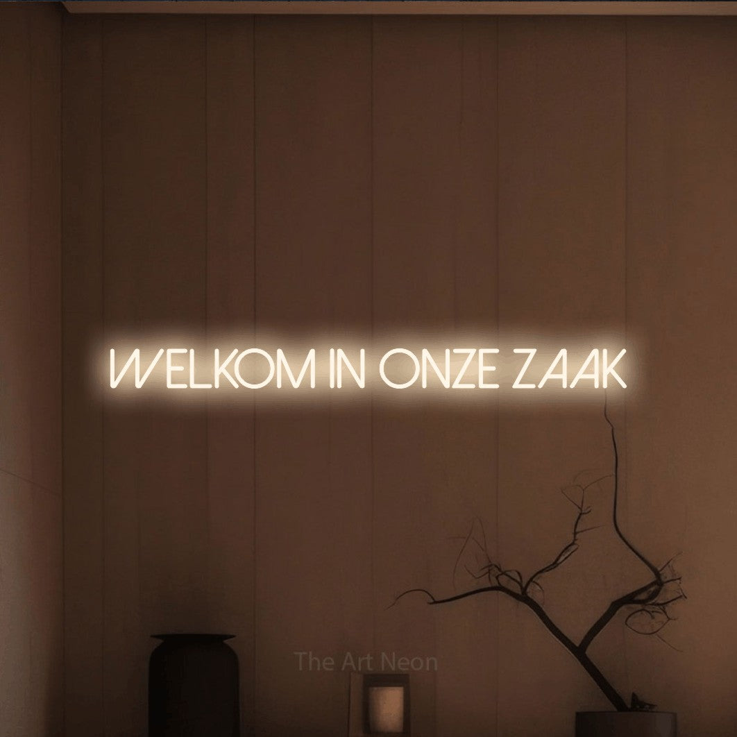 LED neon sign reading “WELKOM in onze zaak”, arranged in a single line.