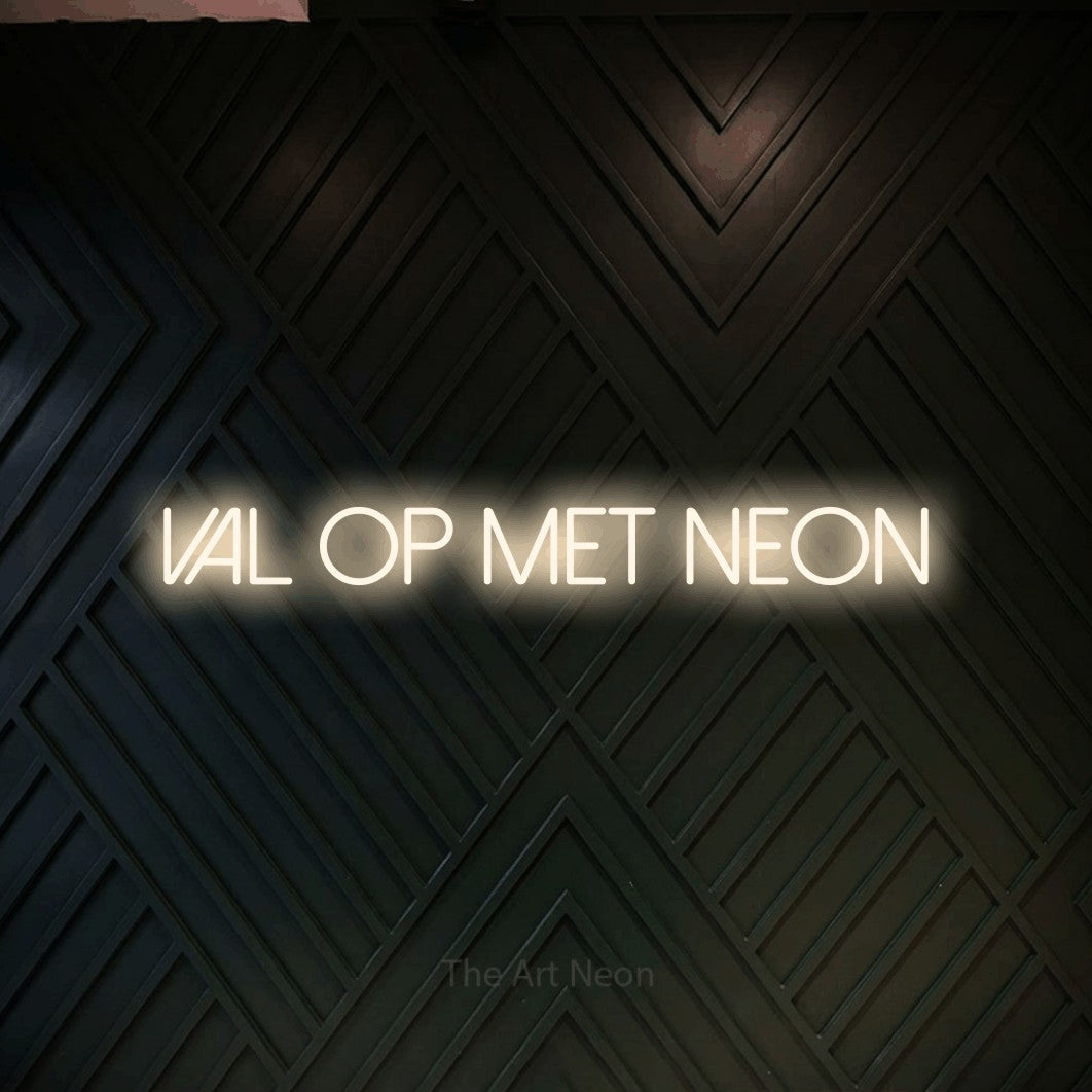 LED neon sign reading “Val Op Met Neon”, arranged in a single line.