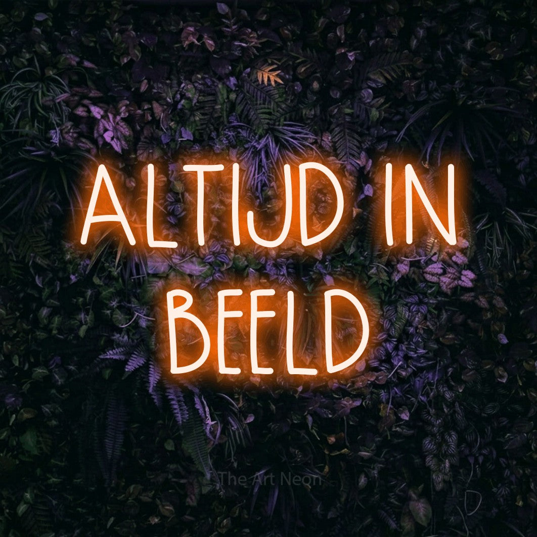 LED neon sign reading “ALTIJD IN BEELD”, arranged in 2 lines.