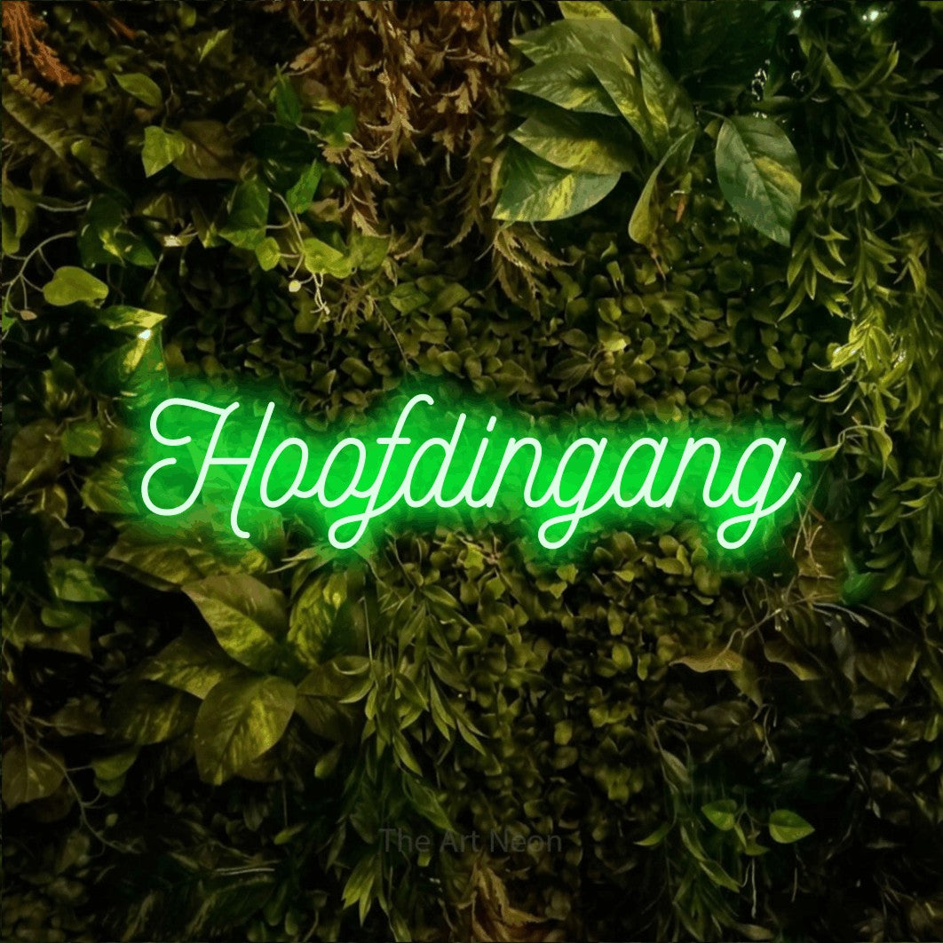 LED neon sign reading “Hoofdingang”, arranged in a single line.