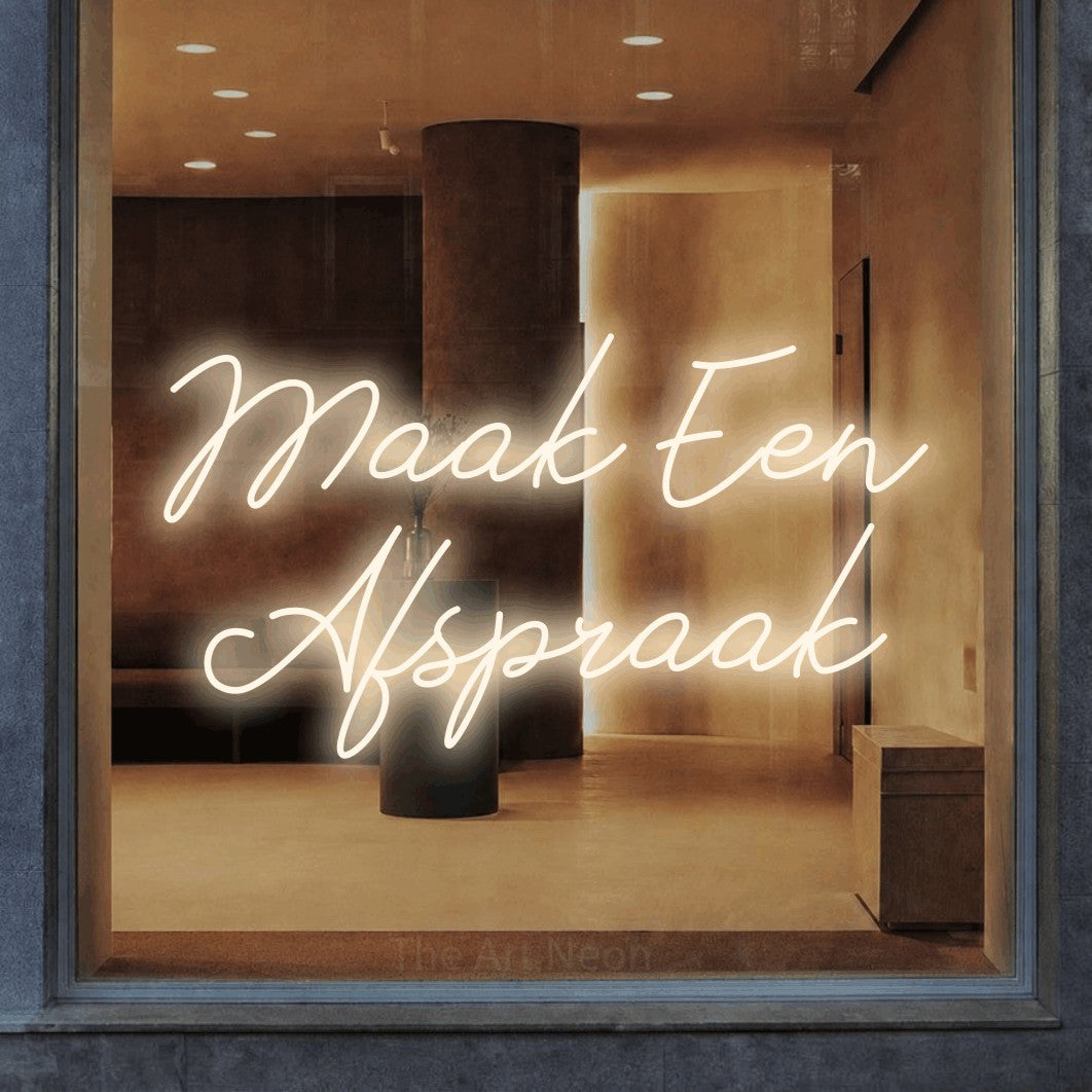 LED neon sign reading “Maak Een Afspraak”, arranged in 2 lines.