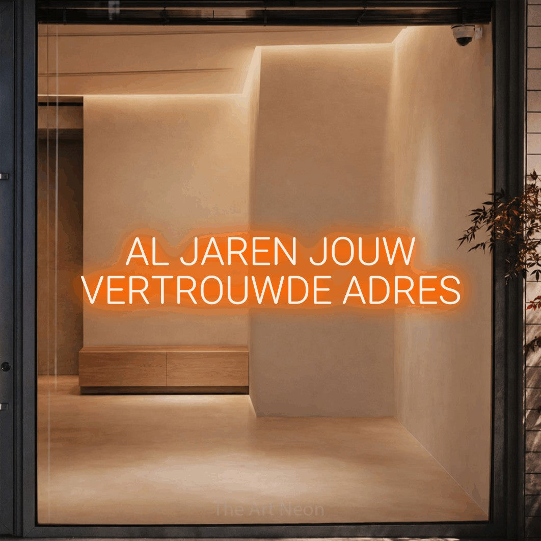 LED neon sign reading “AL JAREN JOUW VERTROUWDE ADRES”, arranged in 2 lines.