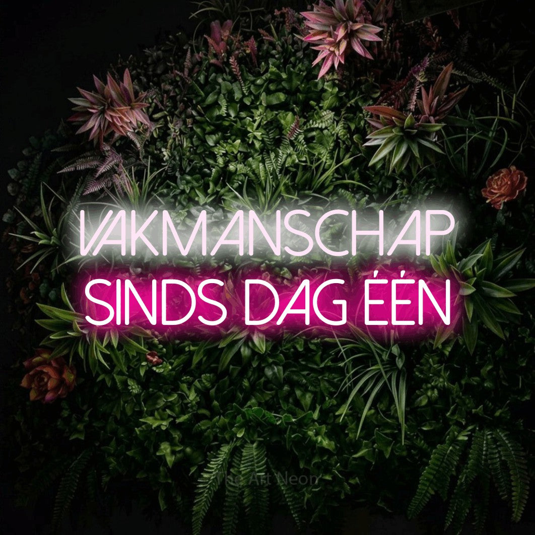 LED neon sign reading “vakmanschap sinds dag één”, arranged in 2 lines.