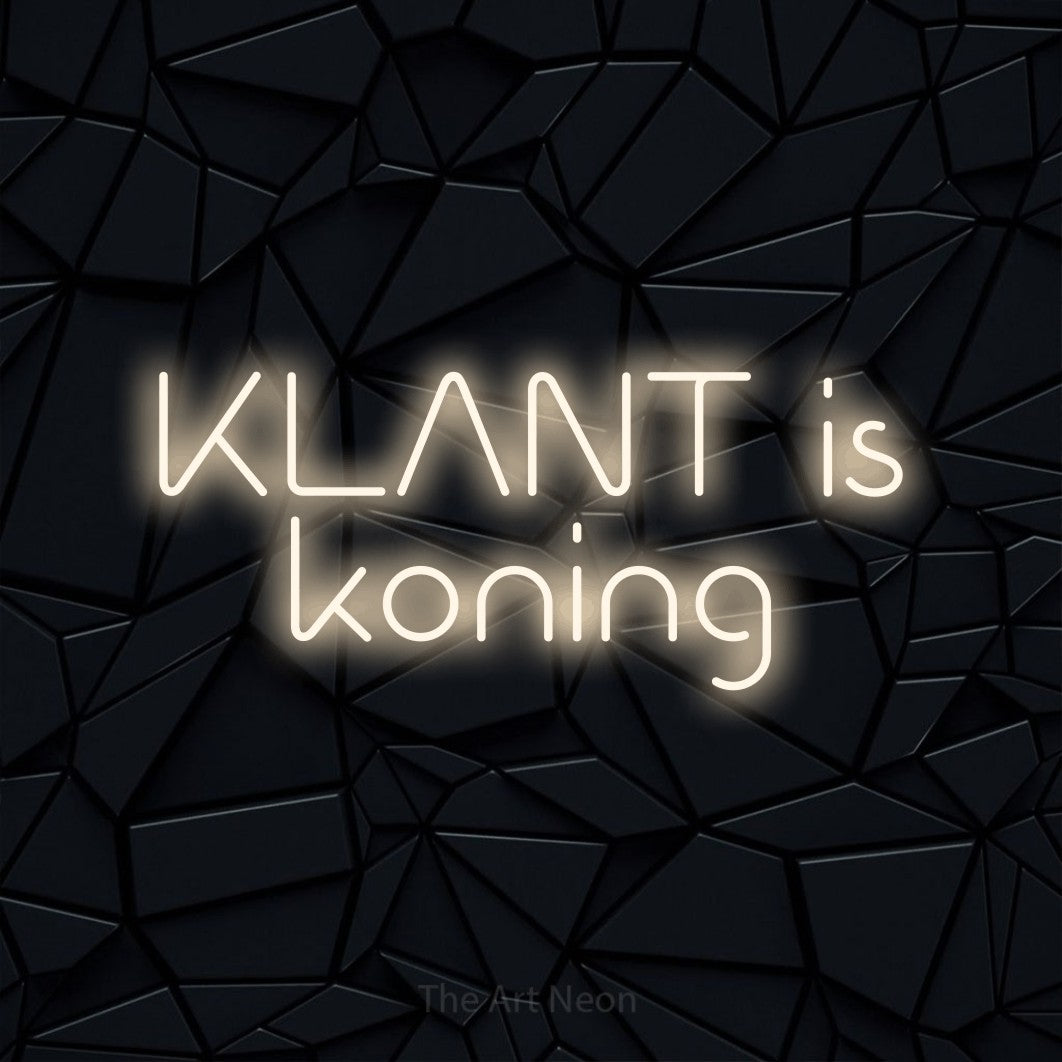 LED neon sign reading “KLANT is koning”, arranged in 2 lines.