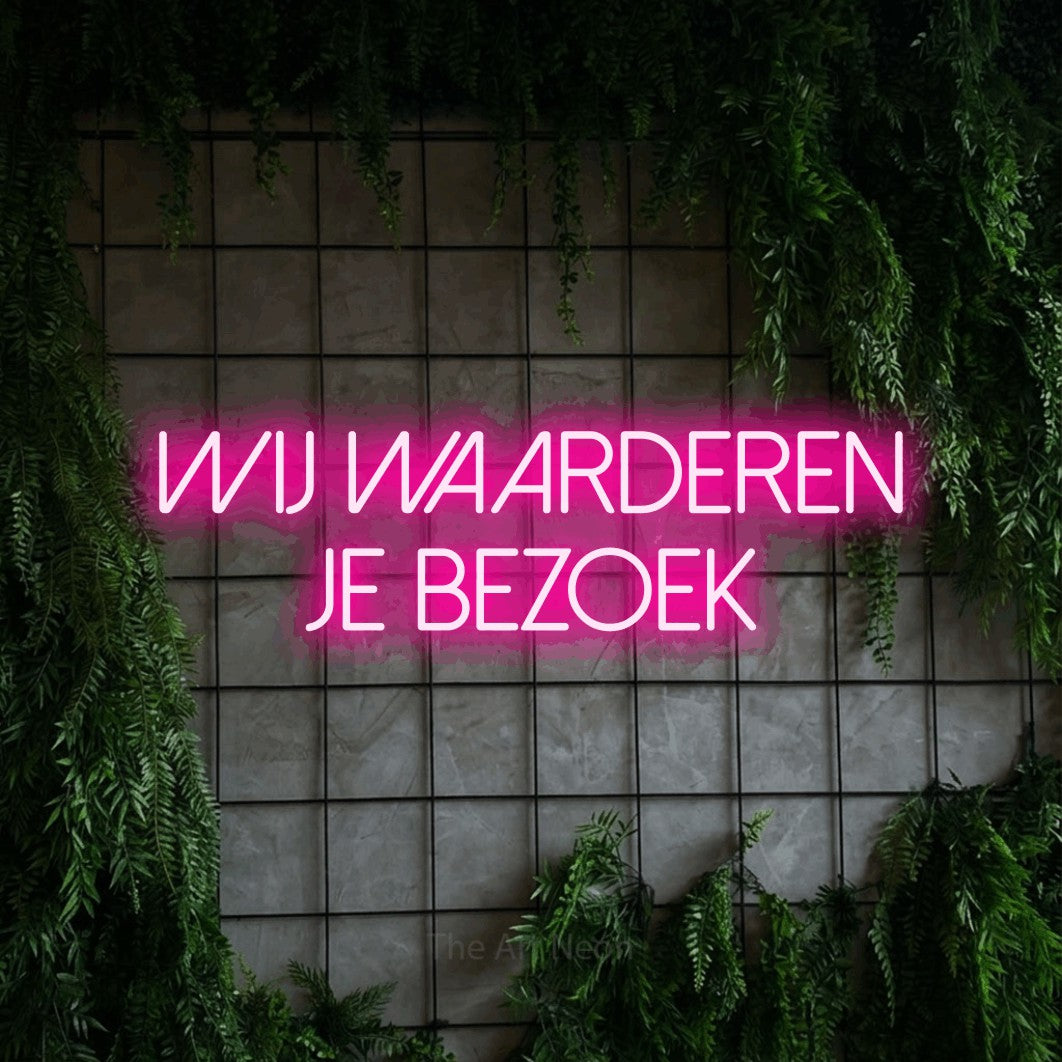LED neon sign reading “Wij Waarderen Je Bezoek”, arranged in 2 lines.