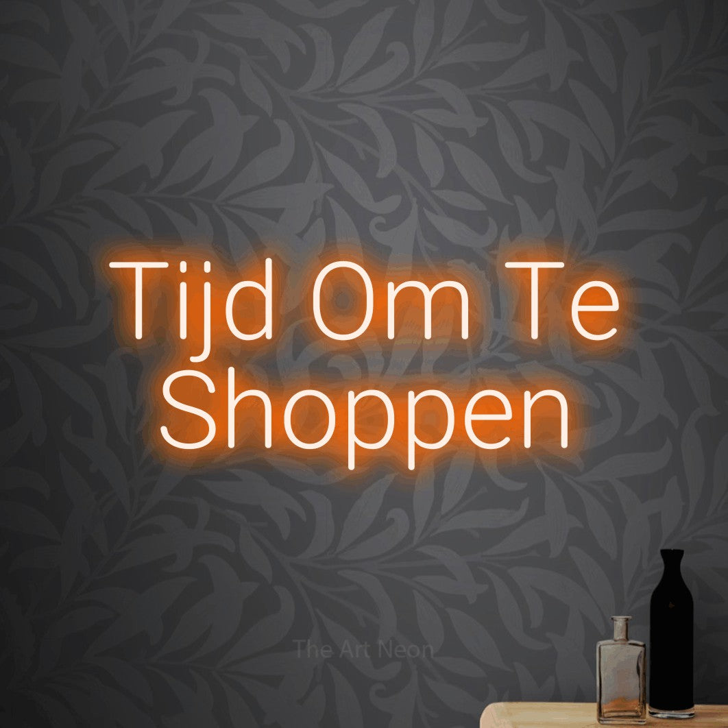 LED neon sign reading “Tijd Om Te Shoppen”, arranged in 2 lines.