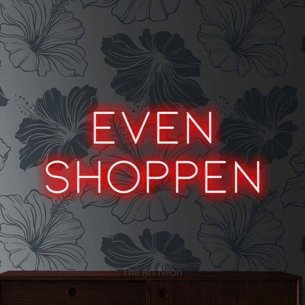 LED neon sign reading “even shoppen”, arranged in 2 lines.