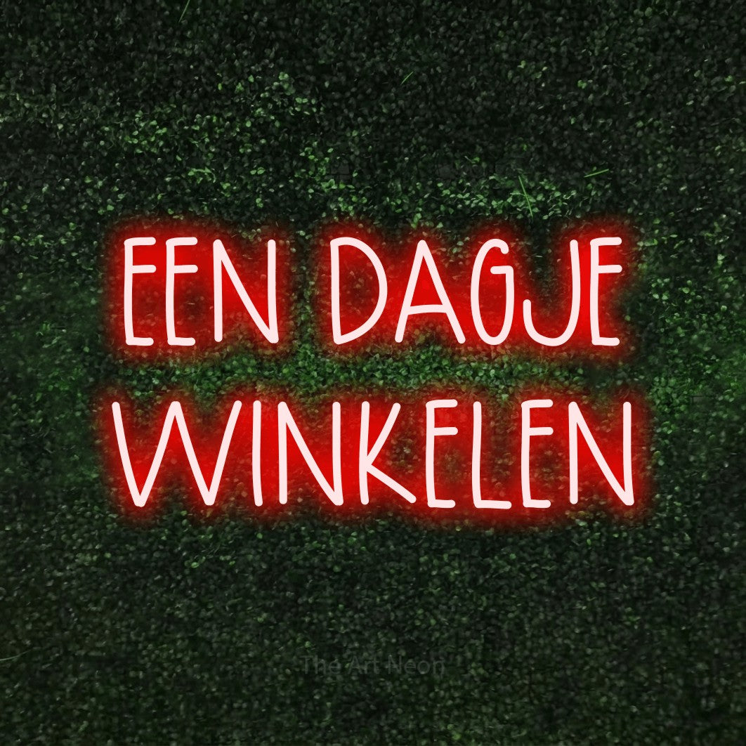 LED neon sign reading “EEN DAGJE WINKELEN”, arranged in 2 lines.