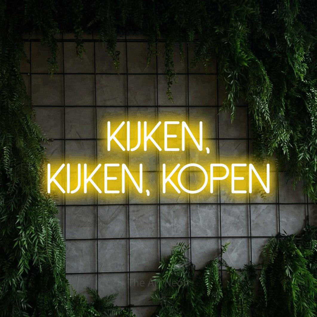 LED neon sign reading “Kijken, Kijken, Kopen”, arranged in 2 lines.