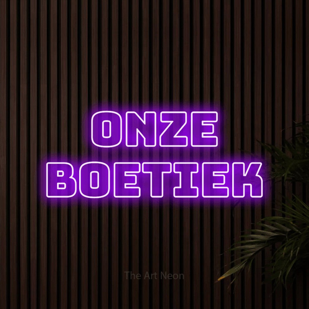 LED neon sign reading “onze boetiek”, arranged in 2 lines.