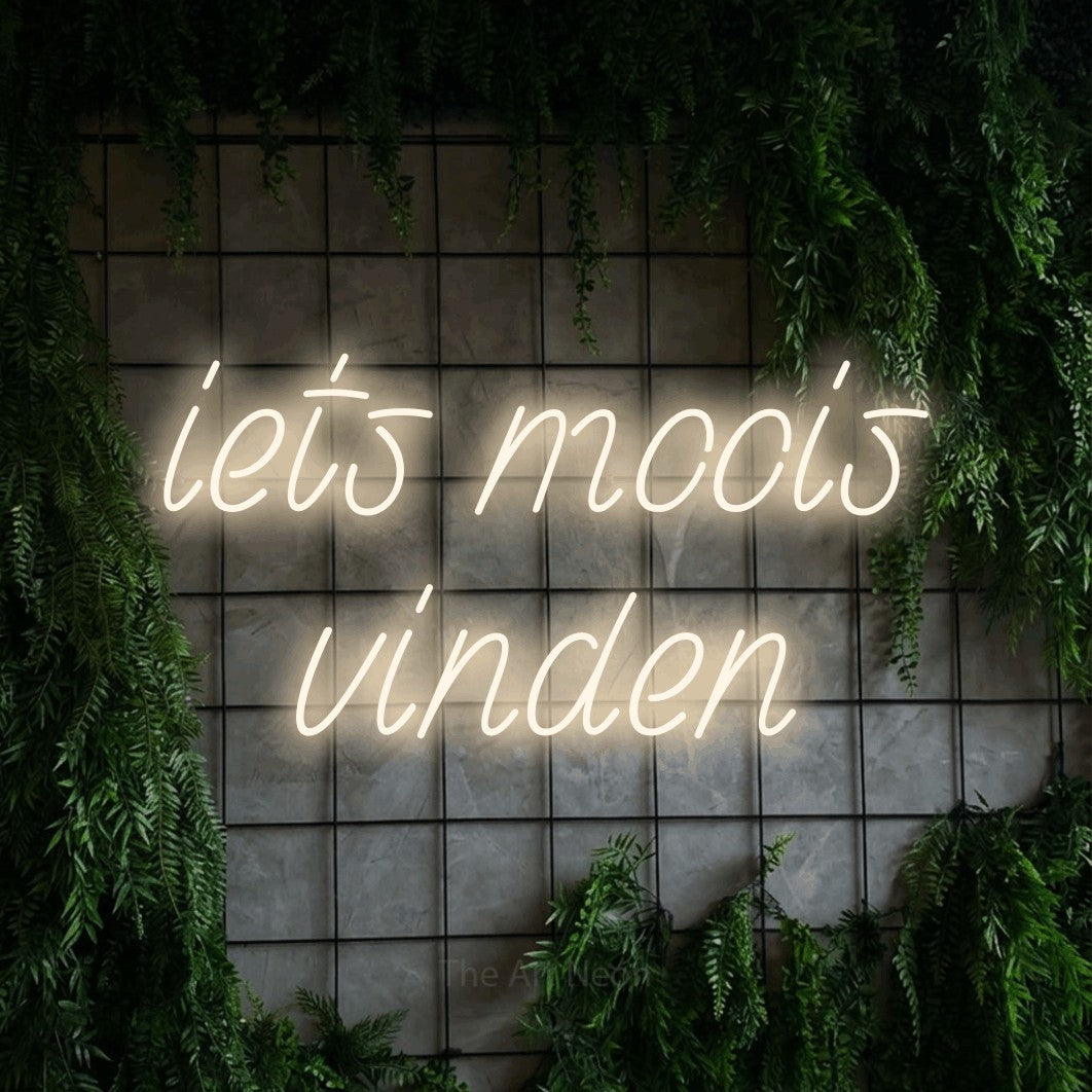 LED neon sign reading “iets moois vinden”, arranged in 2 lines.