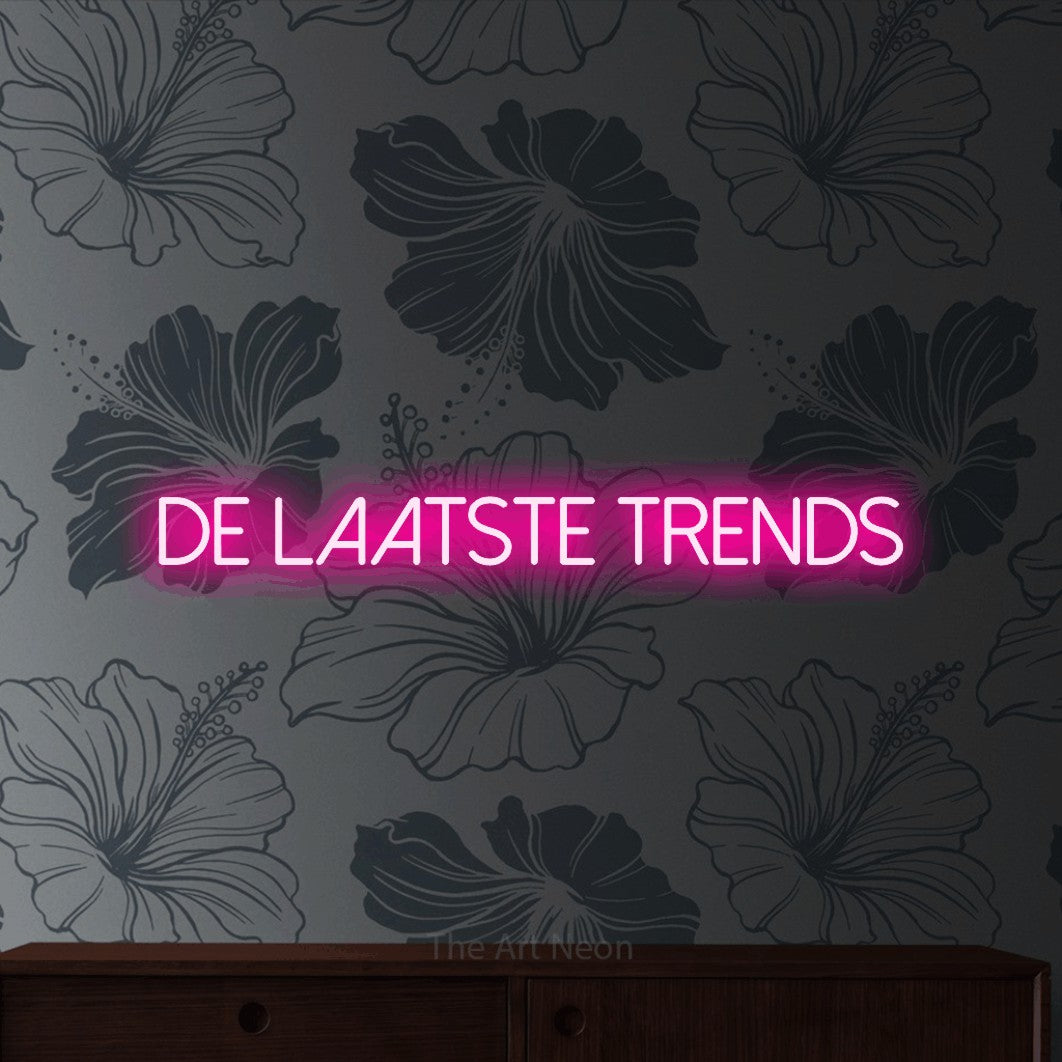 LED neon sign reading “de laatste trends”, arranged in a single line.