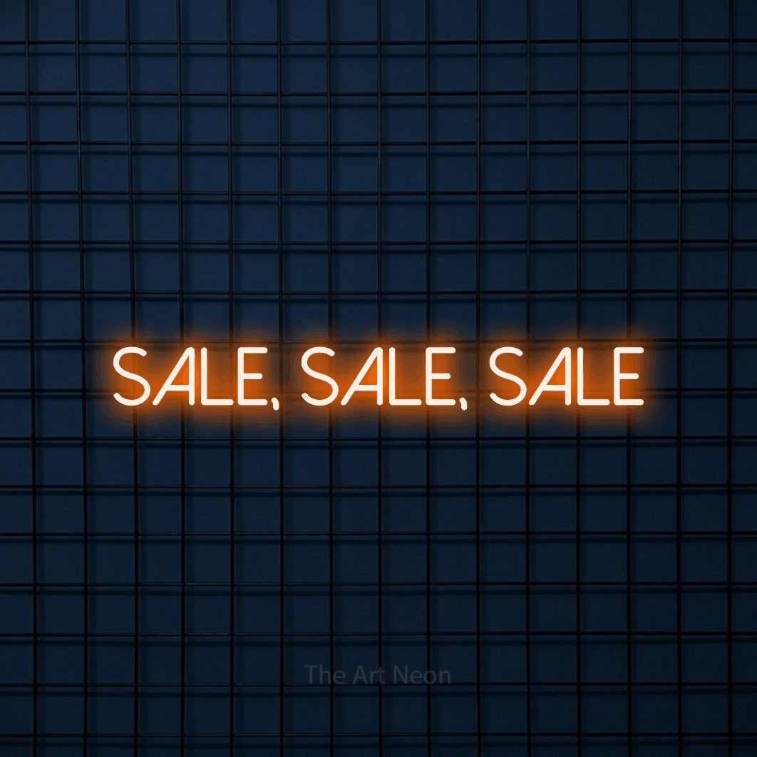 LED neon sign reading “SALE, SALE, SALE”, arranged in a single line.