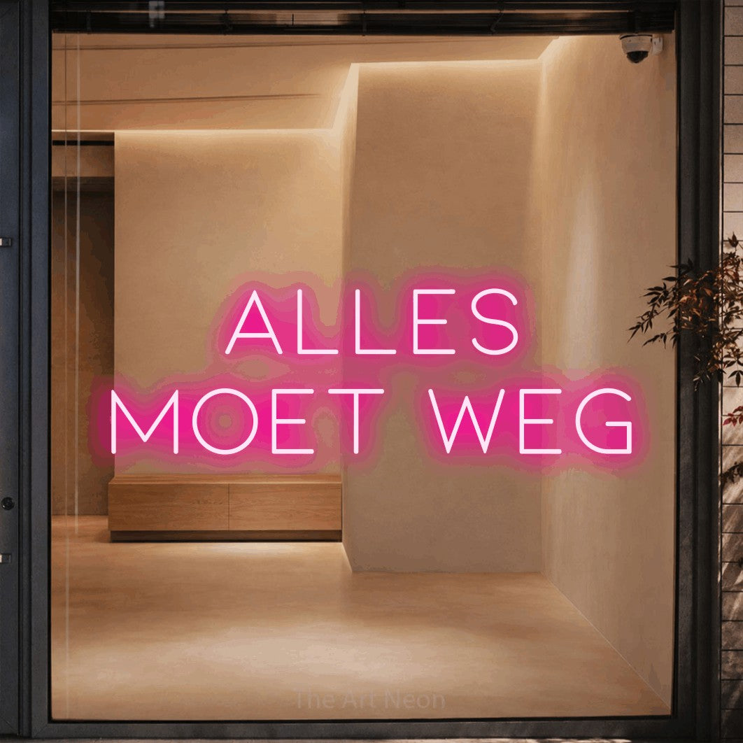 LED neon sign reading “alles moet weg”, arranged in 2 lines.