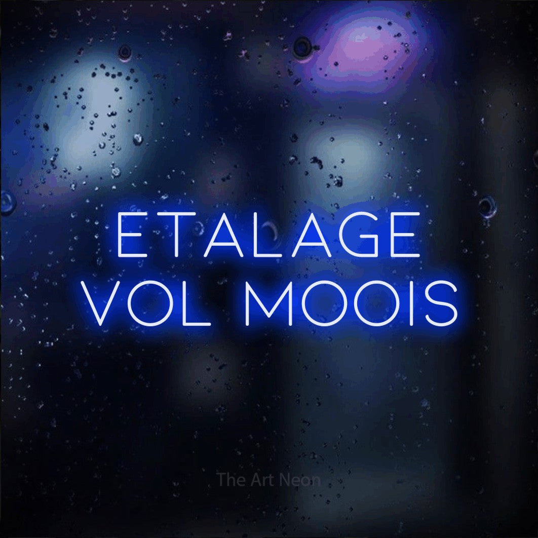 LED neon sign reading “ETALAGE VOL MOOIS”, arranged in 2 lines.
