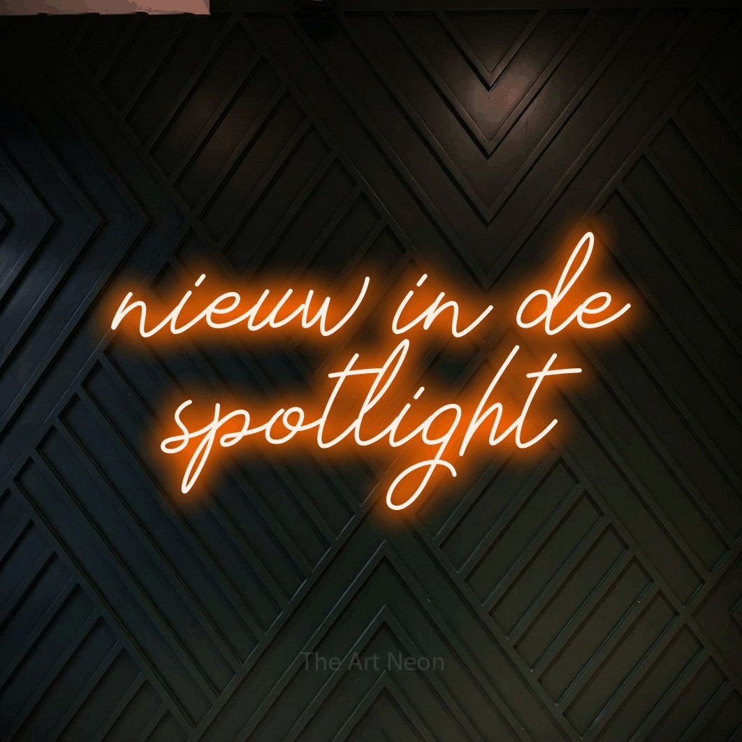 LED neon sign reading “nieuw in de spotlight”, arranged in 2 lines.
