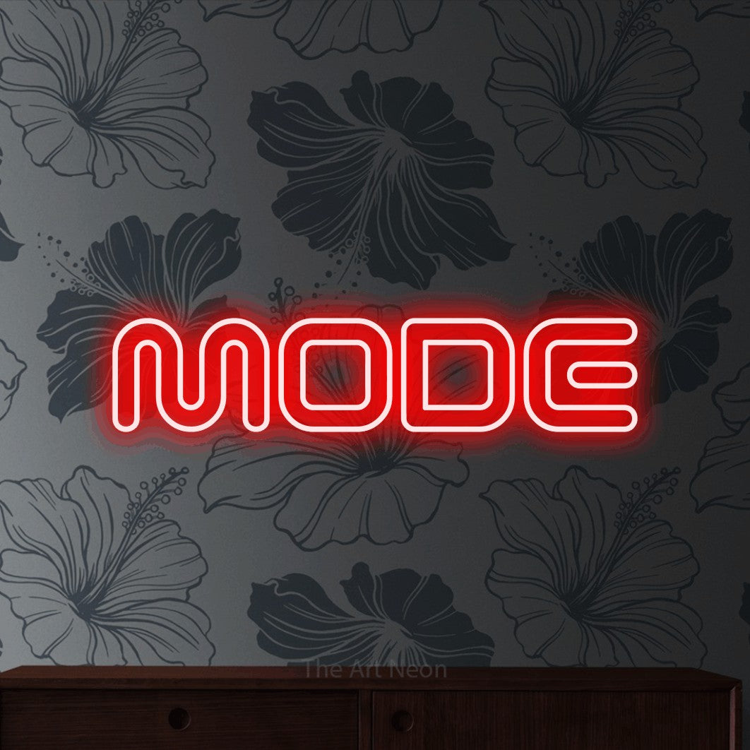 LED neon sign reading “MODE”, arranged in a single line.
