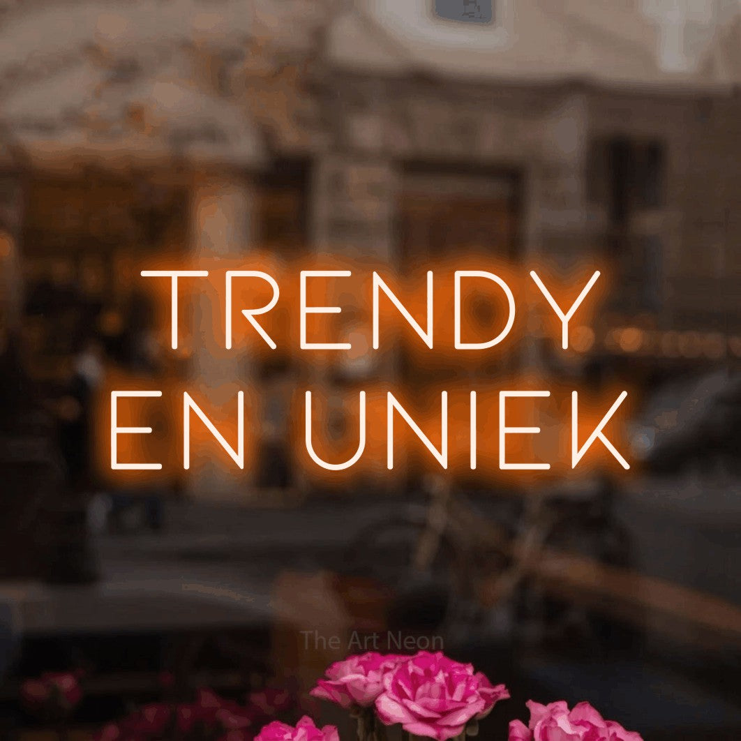 LED neon sign reading “TRENDY EN UNIEK”, arranged in 2 lines.