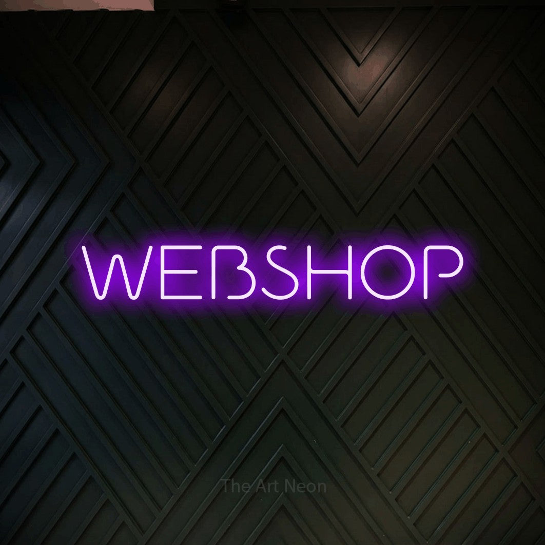 LED neon sign reading “WEBSHOP”, arranged in a single line.