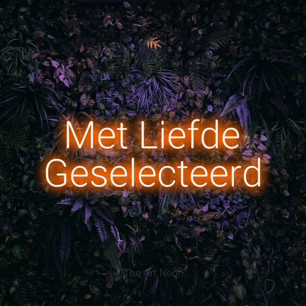 LED neon sign reading “Met Liefde Geselecteerd”, arranged in 2 lines.
