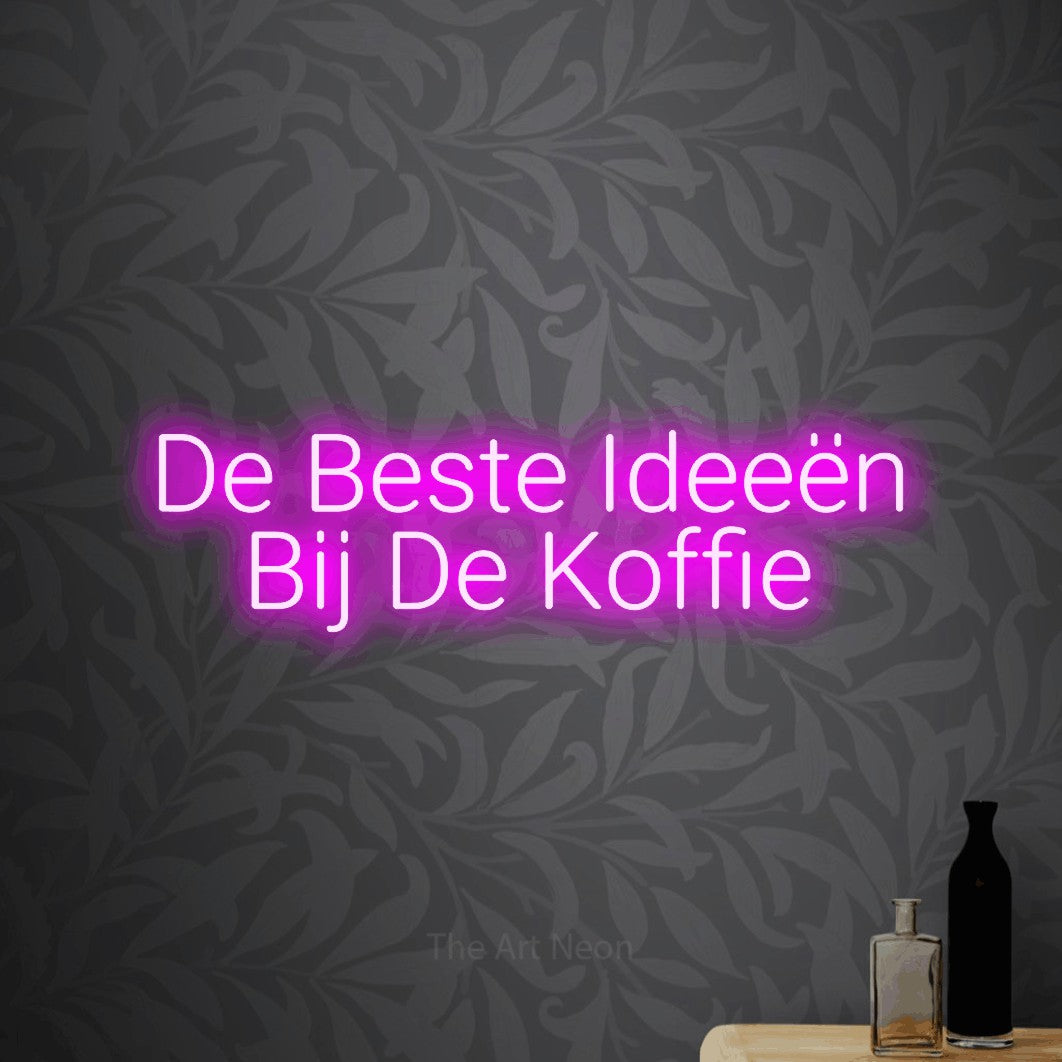 LED neon sign reading “De Beste Ideeën Bij De Koffie”, arranged in 2 lines.