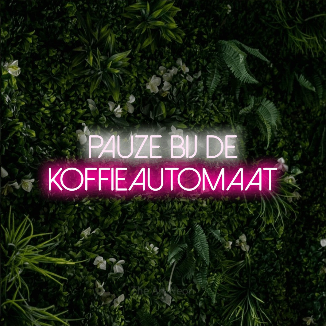 LED neon sign reading “PAUZE BIJ DE KOFFIEAUTOMAAT”, arranged in 2 lines.